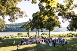wedding ceremony on the lawn at Monteverde at Oldstone venue in New York